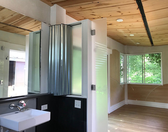 WheelPad Accessible Bathroom Looking Out into Room